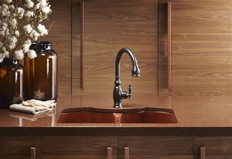 deep reds  oil rubbed bronze sink tan kitchen kitchen  bath design luxury kitchen