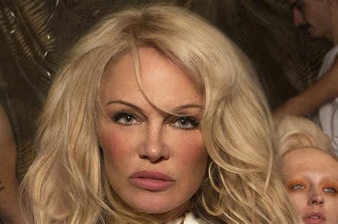 pamela anderson is fierce at 50 as she strips down to undies and