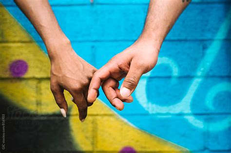 couple holding hands by gic hand love stocksy united