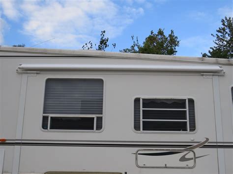 solera rv   awning  wide  projection white lippert rv awnings lcv