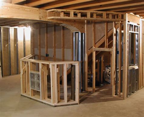 framing basement walls with basement ceiling with floating