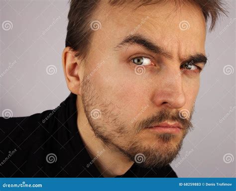 portrait   man suspicious  closeup stock image image  face eyebrows