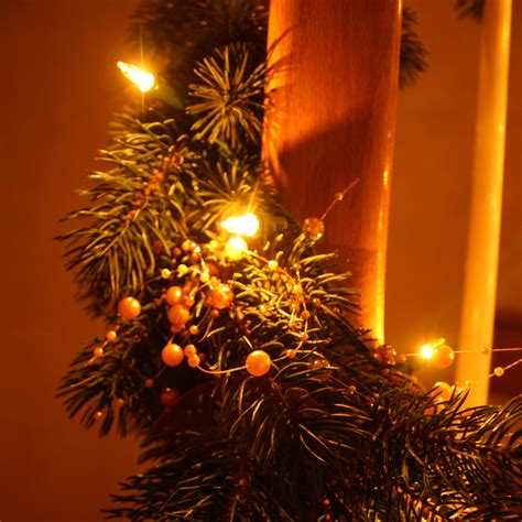 conquering  darkness  christmas lights  hanukkah candles