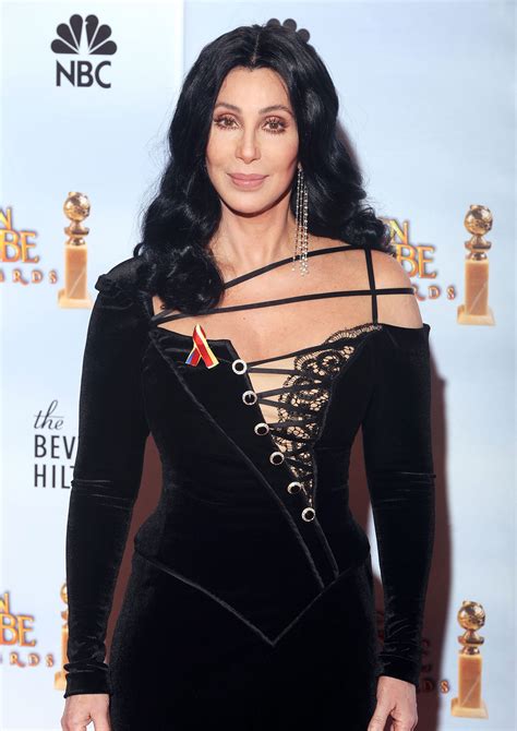 Cher S Style Fashion Evolution Memorable Looks Through The Years