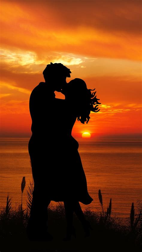 Couple 4k Wallpaper Romantic Kiss Silhouette Sunset