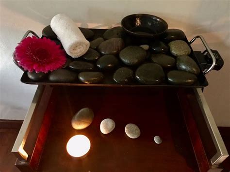 feel the warmth of our hot stone massage sheratongrancanaria