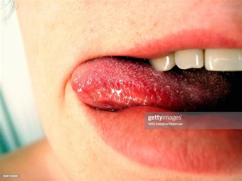 closeup of a woman licking lips photo getty images