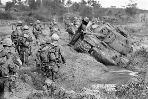 marines move   abandoned  patton tank   vietnam war