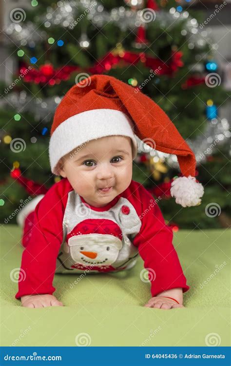 baby dress  christmas holiday  cute face stock photo