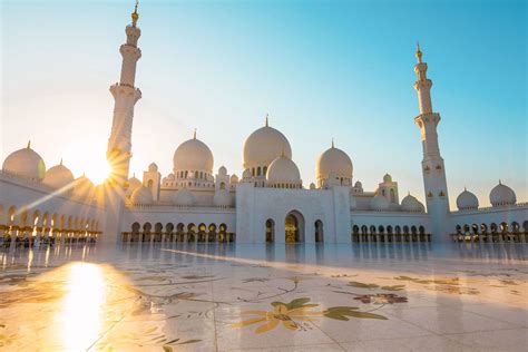 sunset  sheikh zayed grand mosque abu dhabi  travel escape