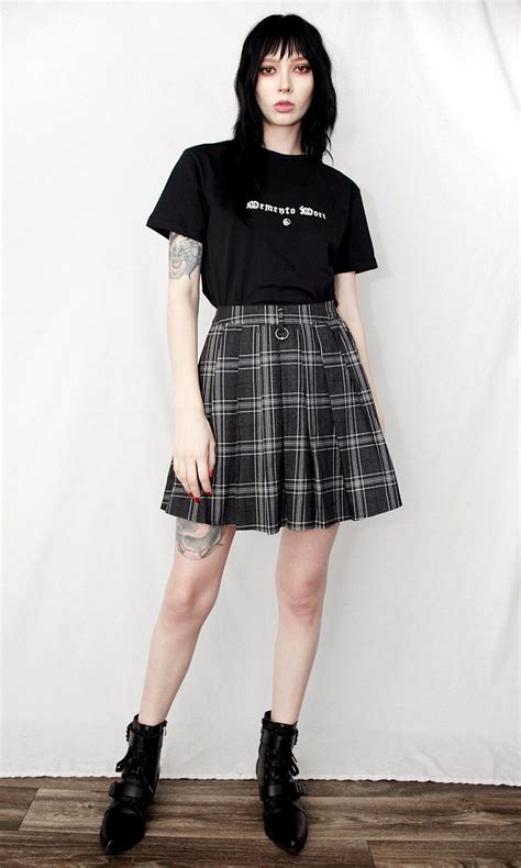 pleated mini skirt with ring piercing hardware on front and back side
