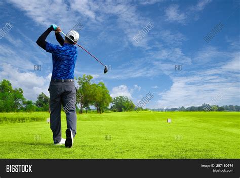 man playing golf  image photo  trial bigstock