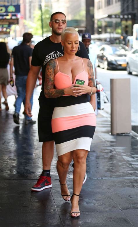 amber rose out and about in nyc and wearing a tight and cleavy dress
