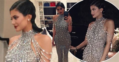 Kylie Jenner Oozes Glamour In Glitzy Gown As She And Tyga Scrub Up For