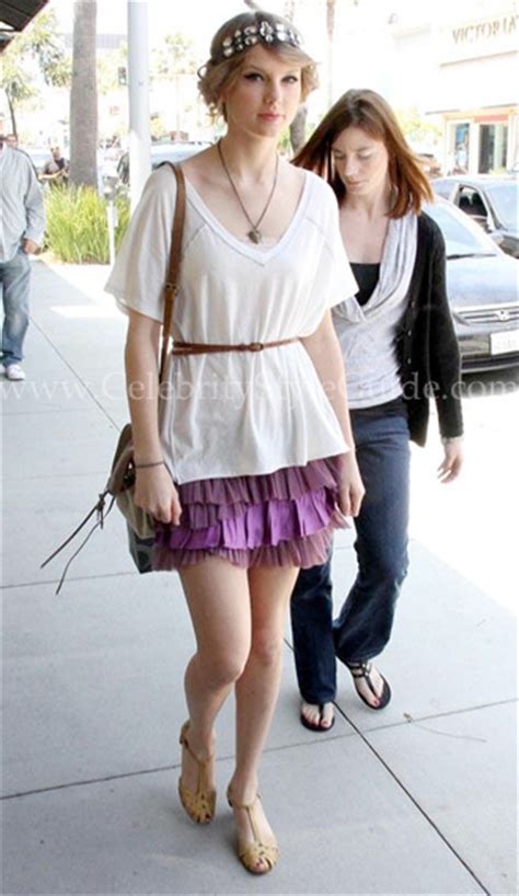 taylor swift wearing free people ruffled layers skirt celebrity style guide