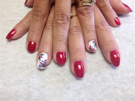 red sparkle nails  white  firework accent nails oasis salon