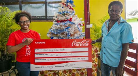 nieuwe recordopbrengst coca cola christmas caravan donatie van srd  voor odo niti huize