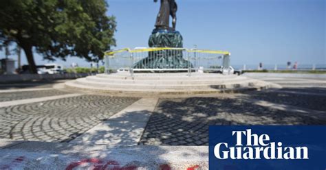 confederate monuments tagged with anti racist messages in pictures