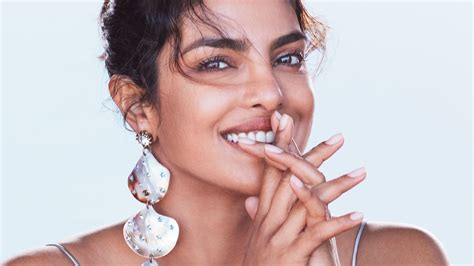 activist actress priyanka chopra tests shoulder grazing earrings vogue