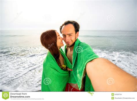 couple  towels   beach stock photo image  ocean towel