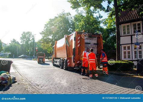 soest germany july   waste collection vehicle  workers  germany editorial stock