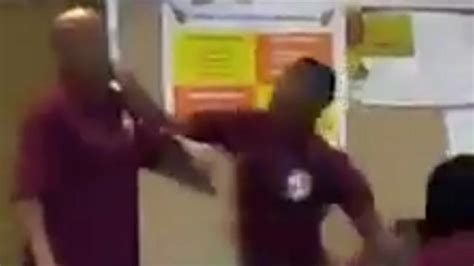 teen beats teacher in class as others watch laugh