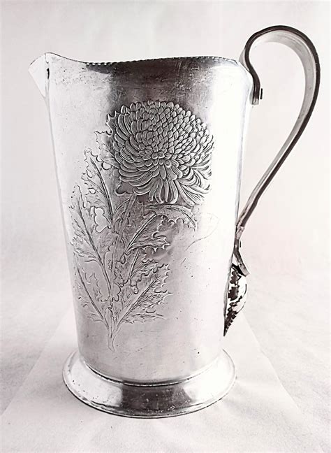 continental hand wrought silverlook pitcher  etsy