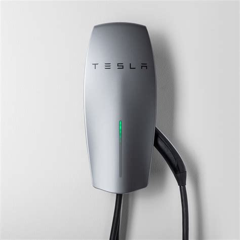tesla launches   home charging station    mounted  plugged   wall outlet