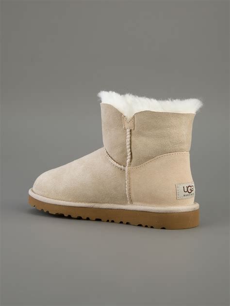 ugg mini bailey button boot in nude natural lyst