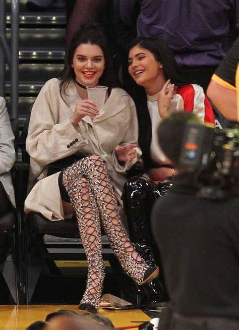 kendall and kylie jenner bring la glamour to lakers game in racy thigh