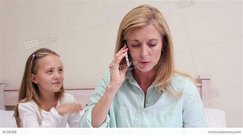 mother ignoring her daughter making a call 영상 소스 8108368