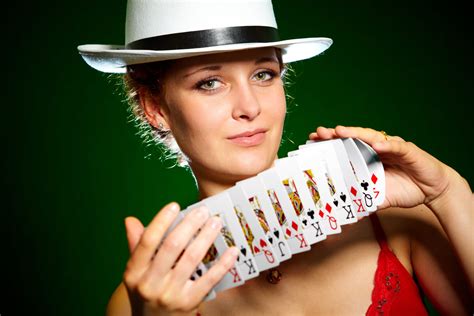Woman Wearing Pink Spaghetti Strap Top While Holding Playing Card Deck