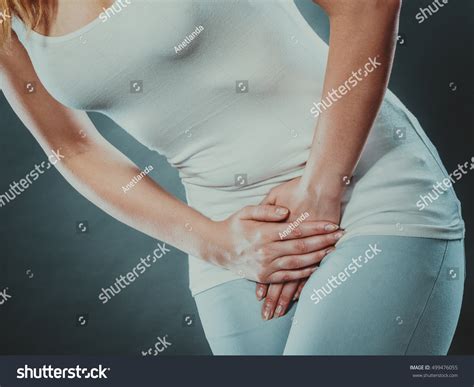 young sick woman hands holding pressing stock photo edit