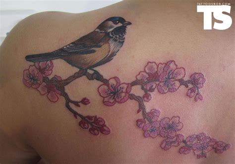 chickadee tattoo google search cherry blossom tattoo shoulder chickadee tattoo symbolic