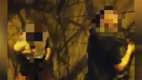two couples caught having sex against flowerbed wall in front of