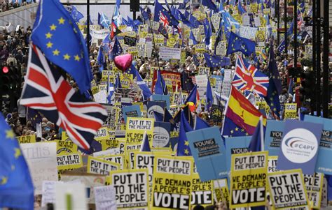 anti brexit marchers flood  london demand  vote  news
