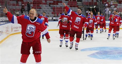 Putin Shoots Scores And Falls Face First On Hockey Ice The New York