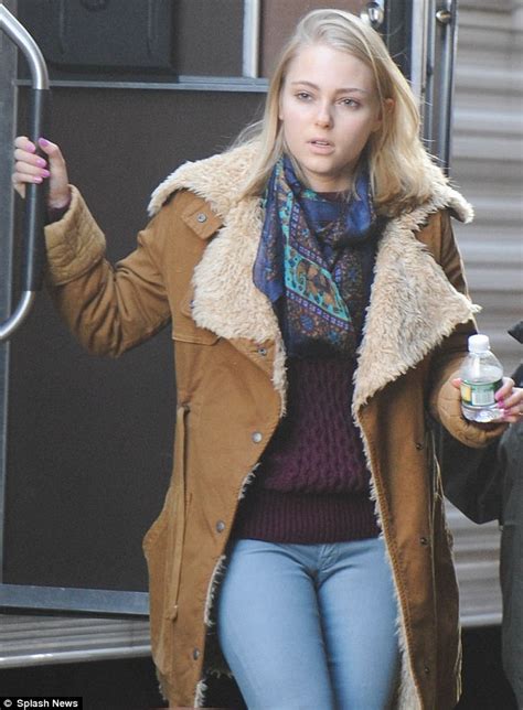 it takes a lot of work to get those carrie curls annasophia robb arrives on the set with her