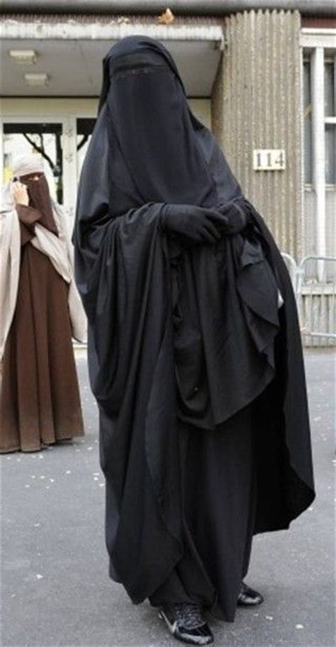beautifully veiled muslimah wears her niqab in front of the french police station despite the