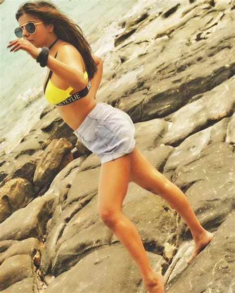 niharikaa agarwal exposes a little too much in a net bikini photos