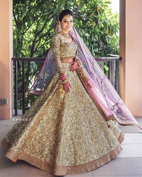 8 Stunning Gold Indian Wedding Dresses For The Bride And Groom