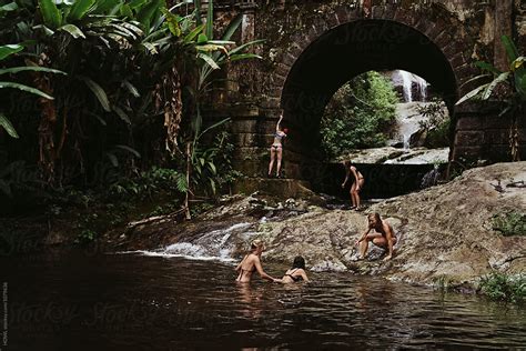 a group of adventurous females explore a hidden lagoon in brazil by