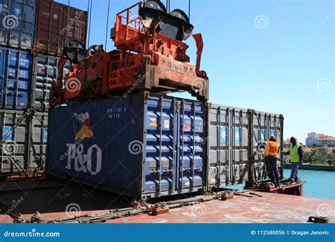 discharging containers   ship editorial photo image  stevedores lashing