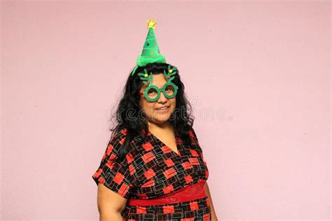 Body Positive Latina Adult Woman Wears Christmas Hat And Shows Her