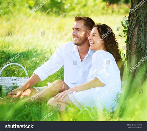 Beautiful Young Couple Having Picnic Countryside Stock