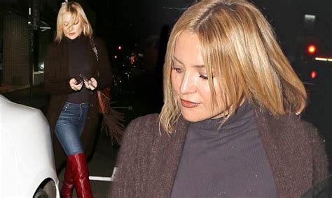 kate hudson puts on a leggy display in thigh high scarlet boots and skintight jeans daily mail