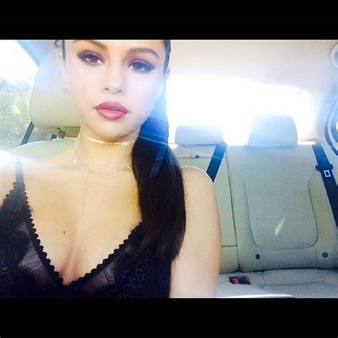 Selena Gomez Flashes Cleavage And Sultry Smize Following