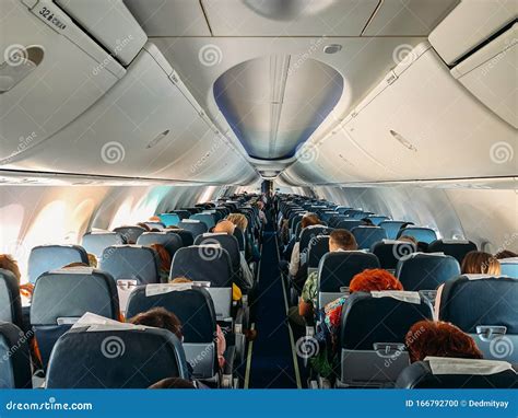 airplane interior   passengers  flight stock photo image  comfortable airplane