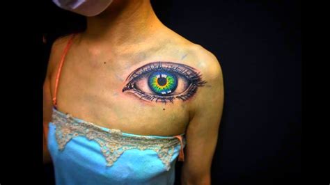 black realistic eyeball tattoo