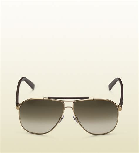 gucci aviator sunglasses with leather brow bar and temples with gucci